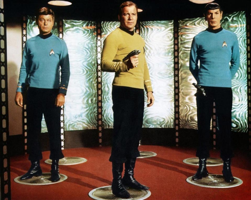 Deforest Kelley as Dr. McCoy, Leonard Nimoy as Spock and William Shatner as Captain James T Kirk in Star Trek: The Original Series (1966-1969) (Paramount)