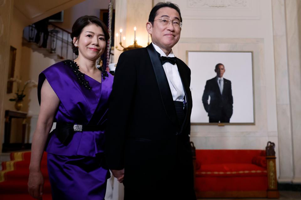 Japanese Prime Minister Fumio Kishida and his wife Yuko Kishida walk through the White House while being hosted by U.S. President Joe Biden and first lady Jill Biden for a state dinner on April 10, 2024 in Washington, DC. Biden welcomed Prime Minister Kishida for an official state visit, as the two leaders discussed strengthening their military partnership and announced new agreements on technology as they look to defend against Chinese aggression in the region.