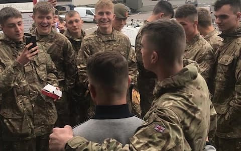 British Army soldiers under initial training are facing an investigation by their superiors for posing for a picture with the founder of the English Defence League (EDL) Tommy Robinson and chanting his name - Credit: Tommy Robinson/Instagram