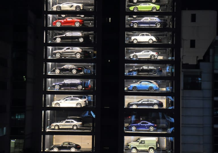 Snickers bar: check. Can of Coke: check. Maserati: check. An innovative car show room in land-starved Singapore is using a vending machine-style system to sell luxury cars