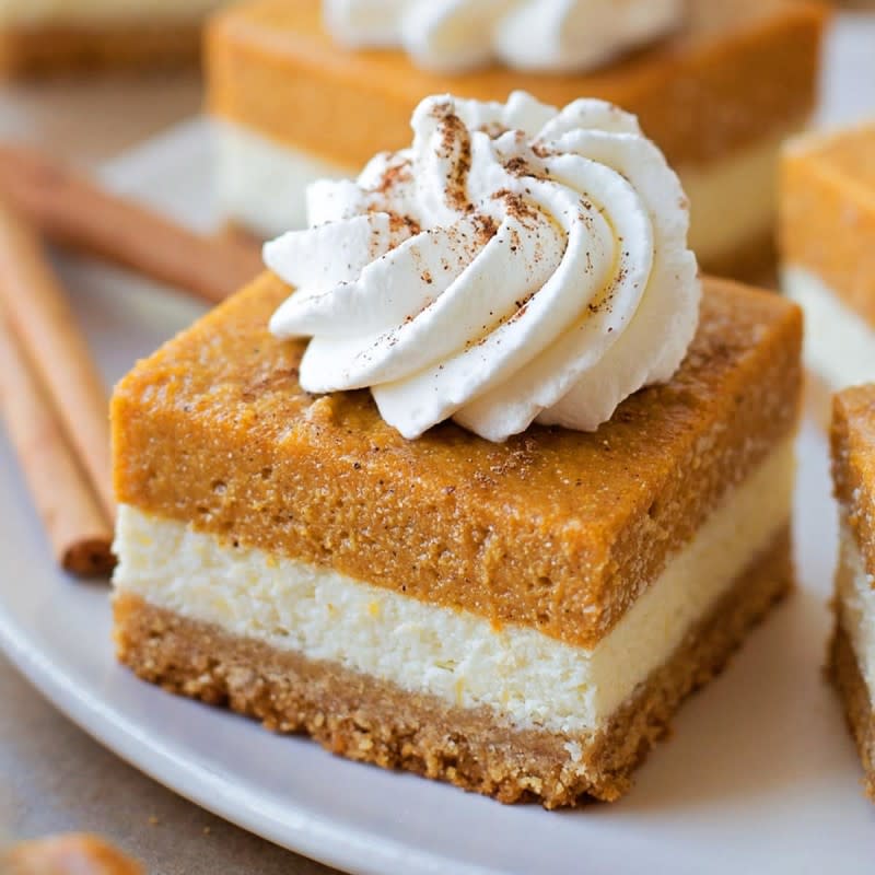 <p>Lil' Luna</p><p>Pumpkin pie cheesecake bars are full of fall spices. This layered dessert is sure to impress at any holiday gathering! </p><p><strong>Get the recipe: <em><a href="https://lilluna.com/pumpkin-pie-cheesecake-bars/" rel="nofollow noopener" target="_blank" data-ylk="slk:Pumpkin Pie Cheesecake Bars;elm:context_link;itc:0;sec:content-canvas" class="link ">Pumpkin Pie Cheesecake Bars</a></em></strong></p>