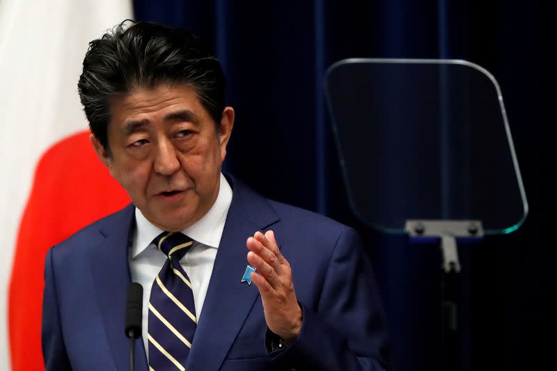 FILE PHOTO - Japan's PM Abe holds news conference on coronavirus disease (COVID-19) in Japan