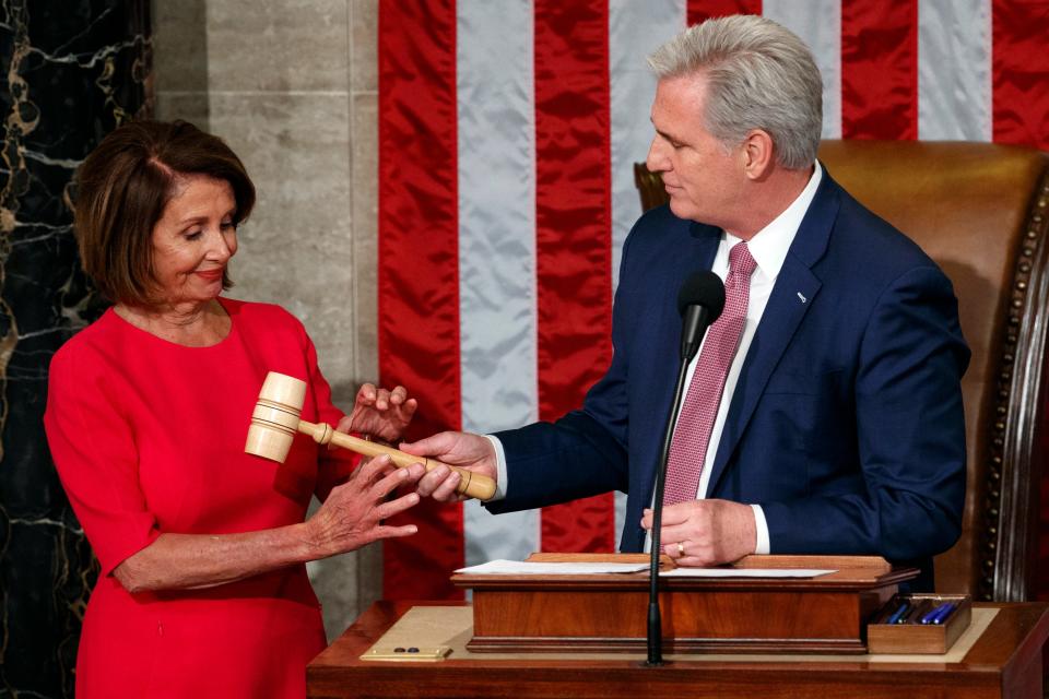 Nancy Pelosi of California takes the gavel from House Minority Leader Kevin McCarthy, R-Calif., after being elected House speaker at the Capitol in Washington, Thursday, Jan. 3, 2019.