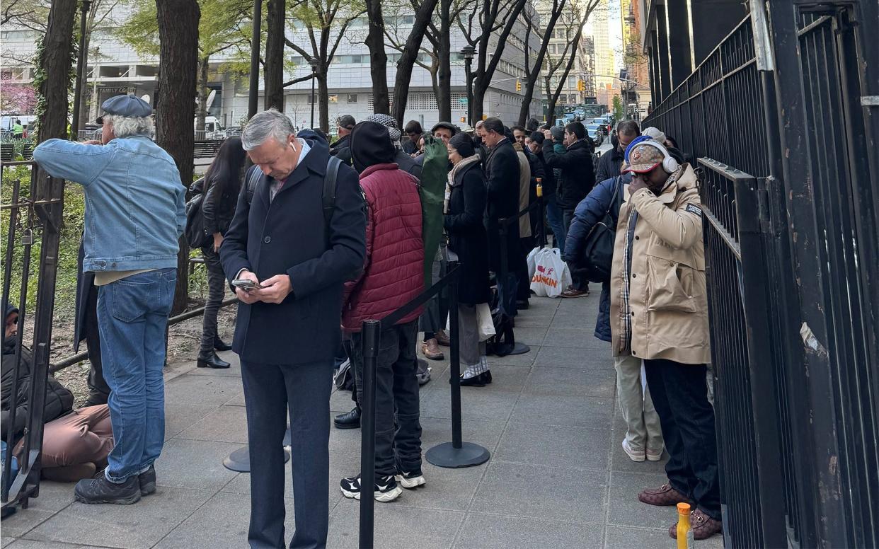 Reporters waiting for the doors to the courthouse to open