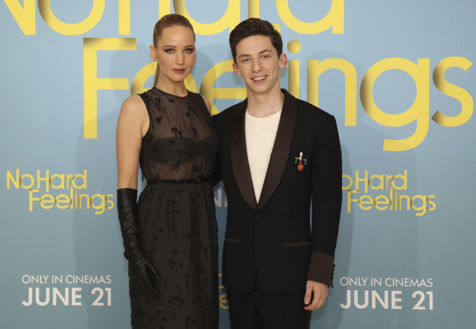 Jennifer Lawrence, left, and Andrew Barth Feldman pose for photographers upon arrival at the premiere of the film 'No Hard Feelings' in London, Monday, June 12, 2023. (Photo by Vianney Le Caer/Invision/AP)