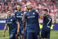 Philipp Hofmann of VfL Bochum celebrates after scoring their side's fourth goal of the game during the Bundesliga soccer match between 1. FC Union Berlin and VfL Bochum, at the An der Alten Forsterei stadium in Berlin, Germany, Sunday May 5, 2024. (Andreas Gora/dpa via AP)