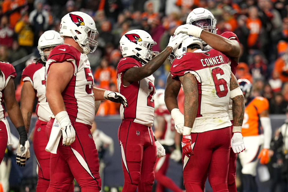 Arizona Cardinals running back James Conner (6) celebrates after scoring a touchdown against the Denver Broncos during the second half of an NFL football game, Sunday, Dec. 18, 2022, in Denver. (AP Photo/Jack Dempsey)