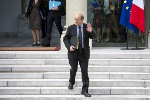 French Defence Minister Jean-Yves Le Drian, pictured on June 6, arrived in Afghanistan on Sunday hours after an attack that killed four French soldiers and an announcement that the nation would begin withdrawing troops in July