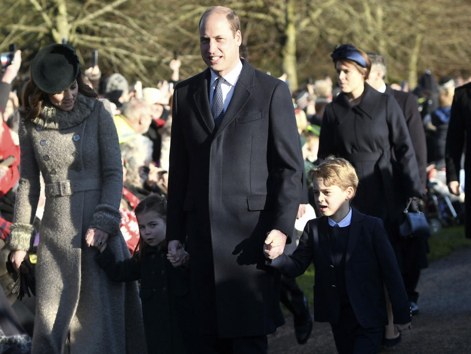 From left, Kate, Duchess of Cambridge, Britain's Prince William and their children Prince George, right, and Princess Charlotte arrive to attend the Christmas Day morning church service at St. Mary Magdalene Church in Sandringham, Norfolk, England, Wednesday, Dec. 25, 2019. (Joe Giddens/PA via AP)