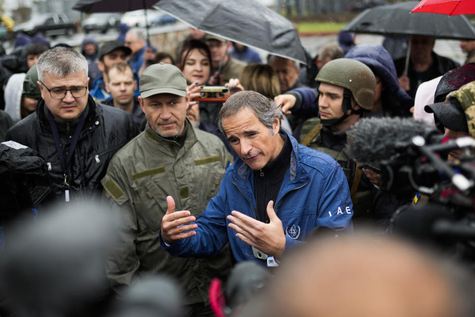 Director General of the International Atomic Energy Agency (IAE) Rafael Grossi talks to journalists as he arrives with an IAE team to Chernobyl nuclear power plant, in Chernobyl ,Ukraine, Tuesday, April 26, 2022. (AP Photo/Francisco Seco)