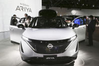 Nissan Motor Co.'s new electric crossover Ariya is displayed at Nissan Pavilion in Yokohama near Tokyo Tuesday, July 14, 2020. The Ariya is the Japanese automaker’s first major all-new model since getting embroiled in the scandal surrounding former Chairman Carlos Ghosn. The vehicle, set to go on sale in Japan by the middle of next year, and in Europe, North America and China by the end of 2021, costs about 5 million yen ($46,000).(AP Photo/Koji Sasahara)