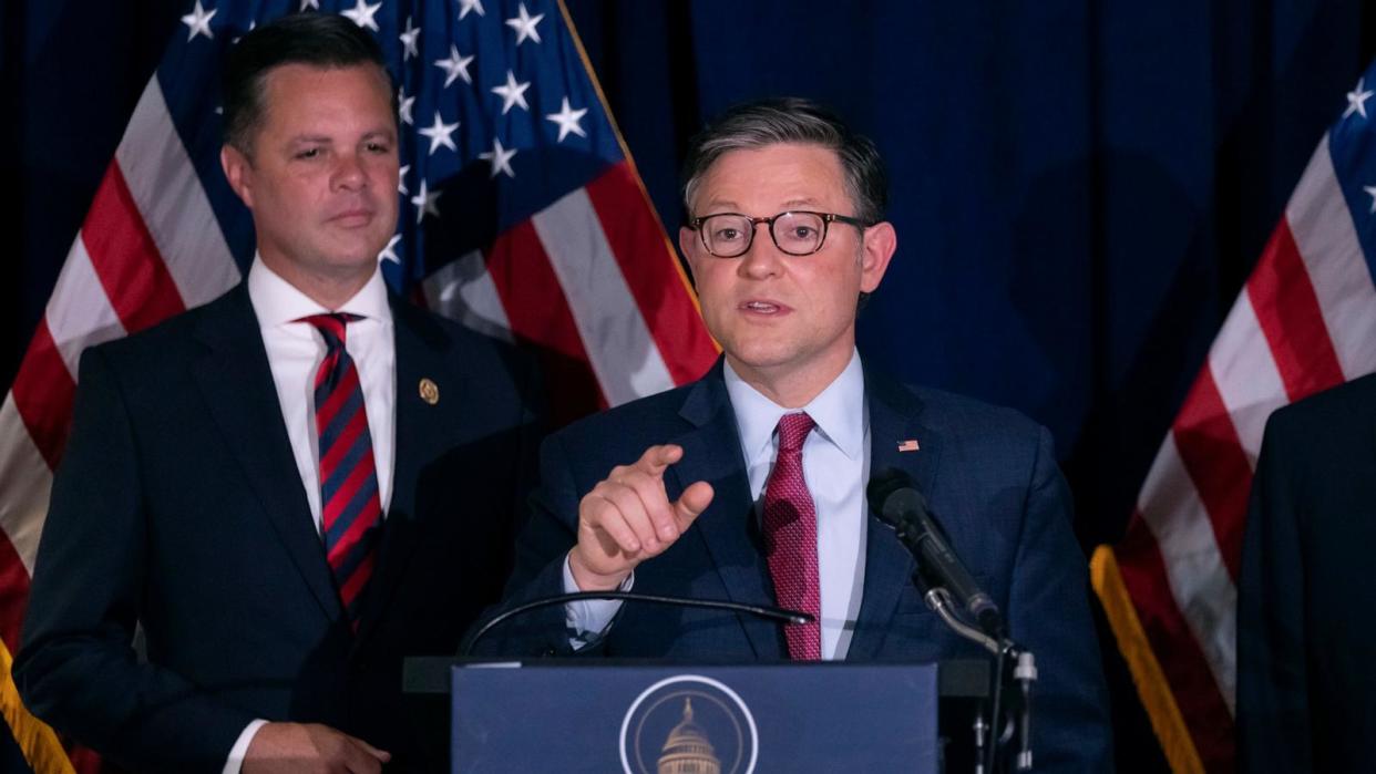 PHOTO: House Speaker Mike Johnson, accompanied by Rep. Zachary Nunn (left), speaks at a news conference at the Republican National Committee headquarters on Capitol Hill in Washington, September 18, 2024. (Ben Curtis/AP)