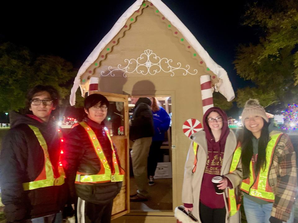 Rider K Club and Road to College Students volunteering at MSU Burns Festival of Lights. Service hours key for scholarships and grant awards.