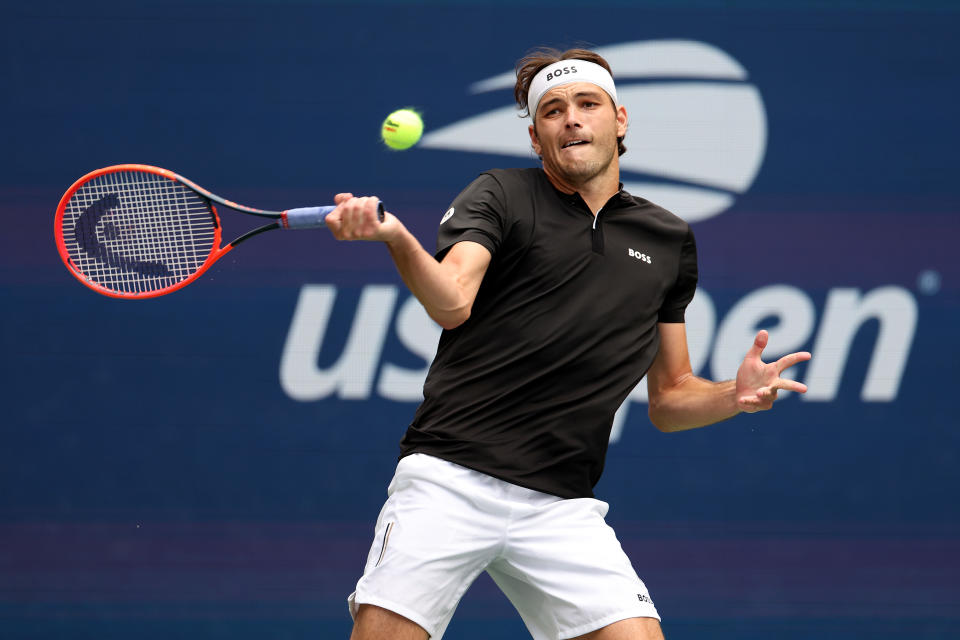 NEW YORK, NEW YORK – AUGUST 30: Taylor Fritz of the United States hits a return against Francisco Comesana of Argentina during their men's singles third round match on day five of the 2024 US Open at the USTA Billie Jean King National Tennis Center on August 30, 2024 in the Flushing neighborhood of the Queens borough of New York City. (Photo by Luke Hales/Getty Images)