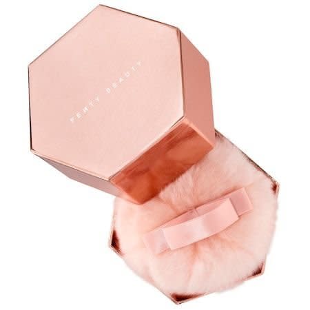 This new addition to Rihanna's Fenty Beauty collection is sure to add some pep to your look. Just dab this oversized puff all over for a light rose-gold shimmer.&nbsp;Get it <a href="https://www.sephora.com/product/fairy-bomb-P54785648?skuId=2067809&amp;icid2=products%20grid:p54785648" target="_blank">here</a>.