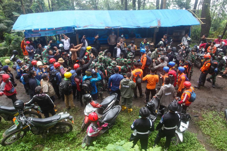 Rescuers prepare for a search and rescue operation after Mount Marapi erupted, on Monday (AFP via Getty Images)