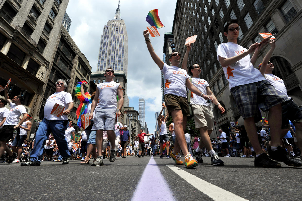 A group walks down Fifth Avenue during t (Stan Honda / AFP via Getty Images file)