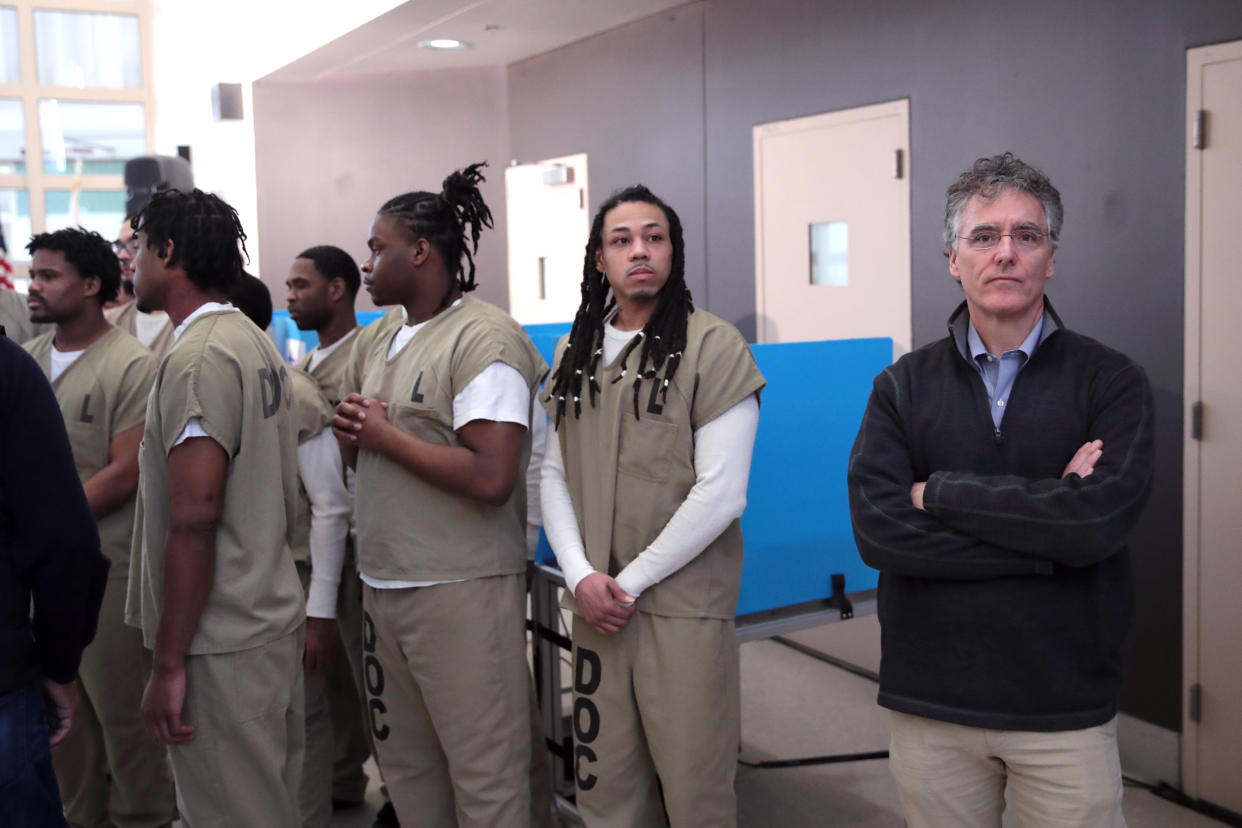 Cook County Sheriff Tom Dart stands with inmates at the Cook County Jail