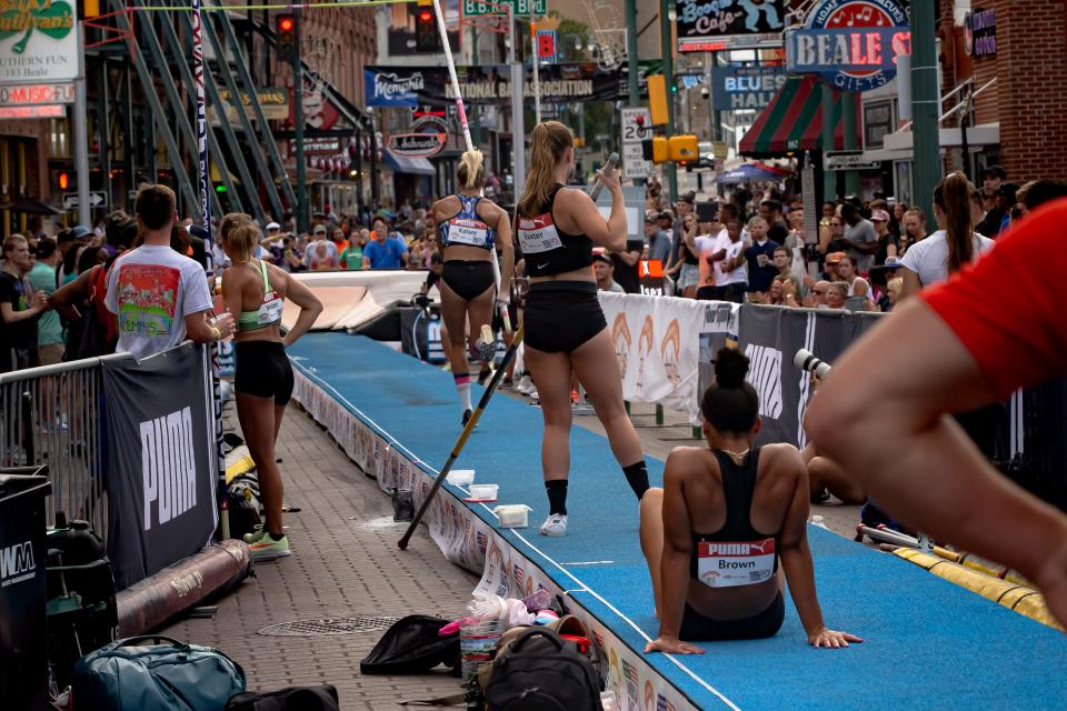 Women athletes prepare to compete at the Ed Murphey Classic pole vault competition held on Beale Street on Saturday July 30, 2022