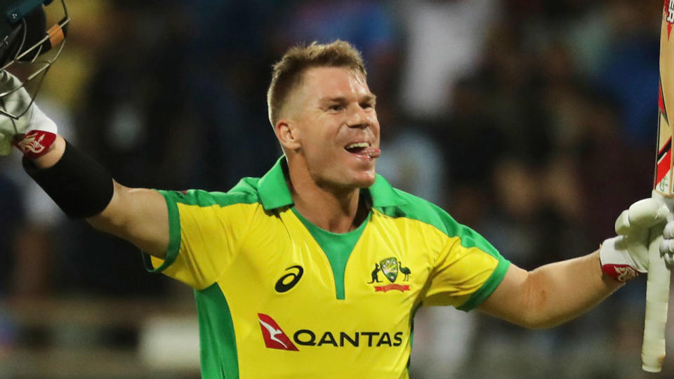 David Warner celebrates after scoring a hundred during the first ODI match between India and Australia in Mumbai, India, Tuesday, Jan. 14, 2020. (AP Photo/Rafiq Maqbool)