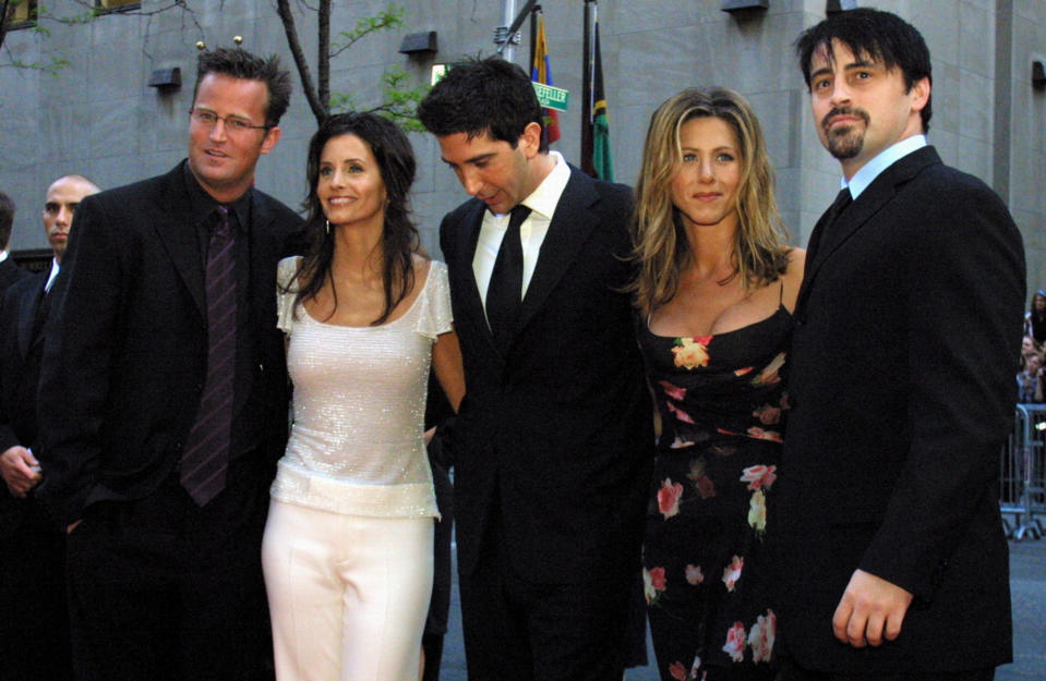 FILE - In this May 5, 2002 file photo, the cast members, Matthew Perry, from left, Courteney Cox Arquettte, David Schwimmer, Jennifer Aniston and Matt LeBlanc of the television show "Friends," arrive at New York's Rockefeller Center for NBC's 75th Anniversary event. Netflix will still be there for fans of the old TV series "Friends," but maintaining the relationship will come at a steep price. The New York Times reported that Netflix paid $100 million to keep showing "Friends" on its U.S. service through 2019. (AP Photo/Tina Fineberg, File)