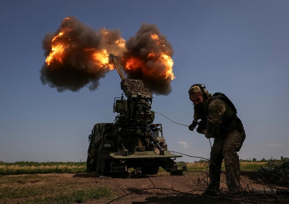 A Ukrainian serviceman of the 57th Kost Hordiienko Separate Motorised Infantry Brigade fires a 2S22 Bohdana self-propelled howitzer towards Russian troops (REUTERS)