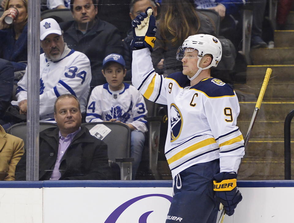 Buffalo Sabres centre Jack Eichel (9) celebrates his goal against the Toronto Maple Leafs during third period NHL hockey action in Toronto on Tuesday, Dec. 17, 2019. (Nathan Denette/The Canadian Press via AP)