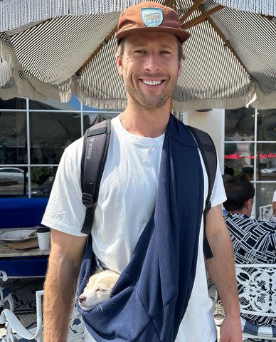 <p>Glen Powell/Instagram</p> Glen Powell and Brisket