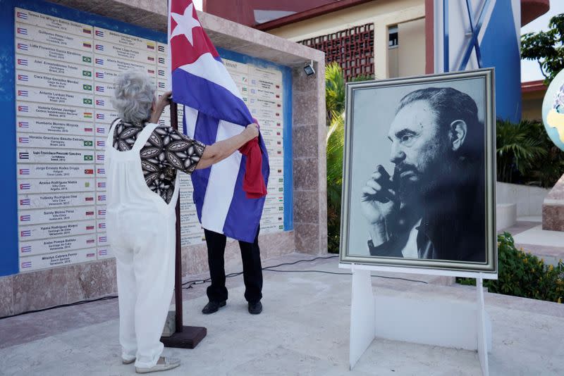 An image of late Cuban President Fidel Castro is seen prior to a farewell ceremony of Cuban doctors heading to Italy to assist, amid concerns about the spread of the coronavirus disease outbreak, in Havana