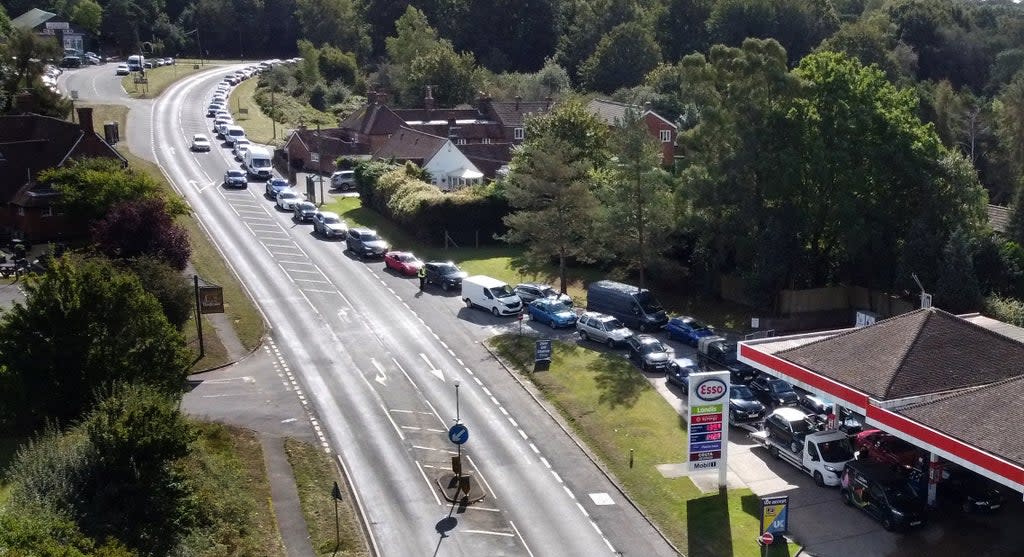 Motorists queue for fuel at a petrol station in Ashford, Kent (Gareth Fuller/PA) (PA Wire)