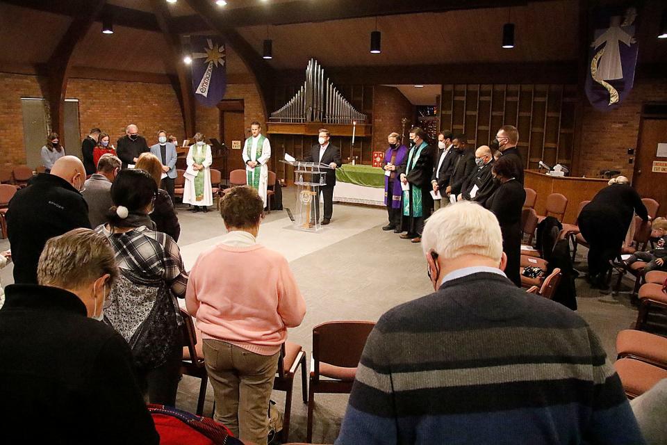 The Rev. Bill Ludwig from Five Stones Community Church offers the opening prayer at the ecumenical prayer service at Ashland Theological Seminary's Ronk Memorial Chapel on Tuesday, Jan. 18, 2022.