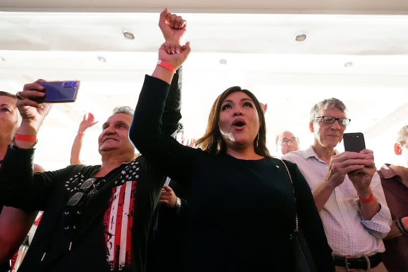 Supporters of Republican Arizona Senate candidate Kari Lake cheer as she speaks on Tuesday, July 30, 2024, in Phoenix. | Ross D. Franklin