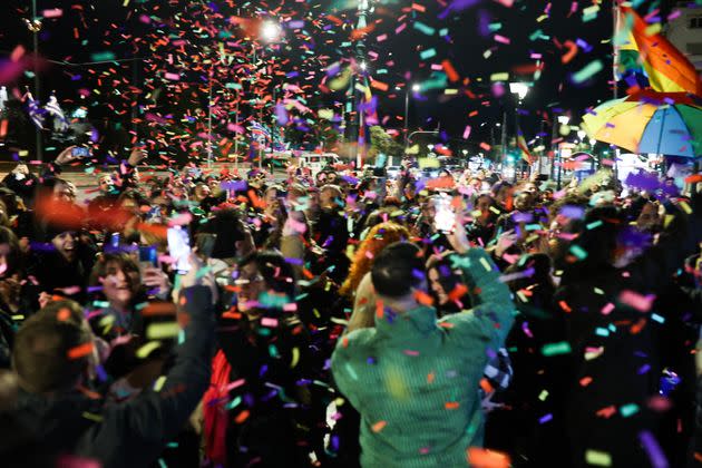 People celebrate the voting of same-sex marriage and the extension of same-sex couples parental rights by Greek parliament in Athens, Greece, on Feb. 15, 2024.