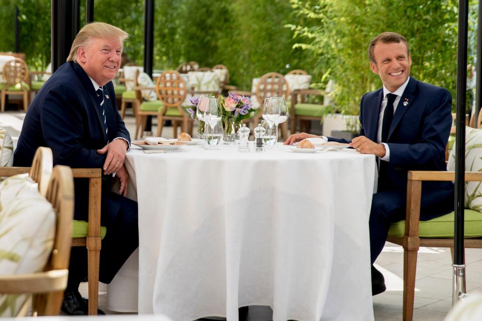 President Donald Trump sits for lunch with French President Emmanuel Macron at the Hotel du Palais in Biarritz, southwest France. Efforts to salvage consensus among the Group of Seven rich democracies on the economy, trade and environment were fraying around the edges even as leaders were arriving before their three-day summit.