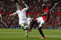 Britain Football Soccer - Manchester United v Swansea City - Premier League - Old Trafford - 30/4/17 Swansea City's Martin Olsson in action with Manchester United's Ashley Young Action Images via Reuters / Jason Cairnduff Livepic