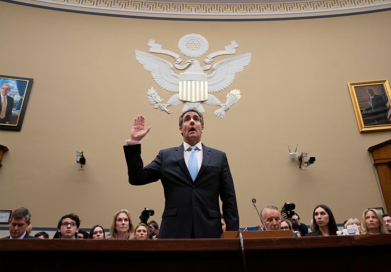 Michael Cohen, President Donald Trump's former personal lawyer, is sworn in to testify before the House Oversight and Reform Committee on Capitol Hill in Washington, Wednesday, Feb. 27, 2019. (AP Photo/J. Scott Applewhite) ORG XMIT: NC106