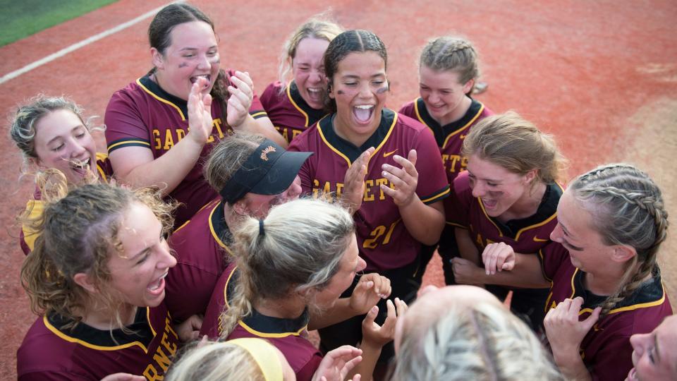 Members of the Haddon Heights High School softball team celebrate after Haddon Heights defeated Bordentown, 3-0, in the state Group 2 semifinal softball game played at Bordentown High School on Wednesday, June 1, 2022.  
