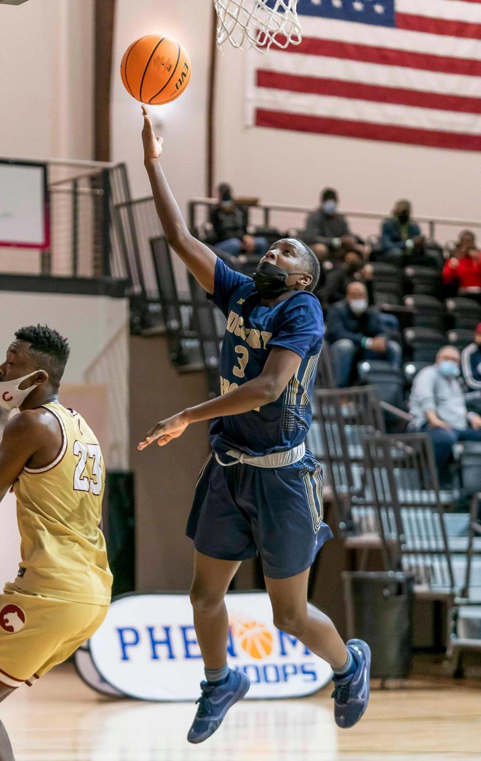 Hickory Grove’s Caiden Stinson (3) drives to the basket for the 2-point layup at the Phenom Holiday Classic Wednesday December 23, 2020.