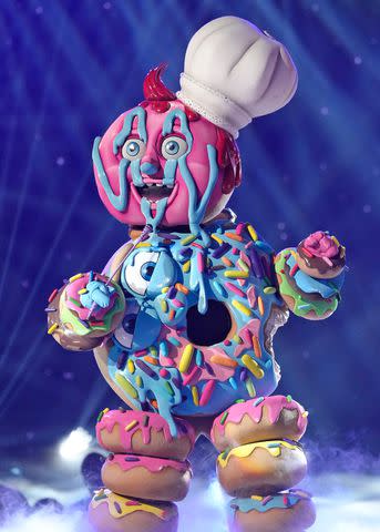 <p>Michael Becker / FOX</p> John Schneider as Donut on "The Masked Singer"