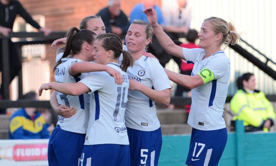 Chelsea players celebrate the winning goal.