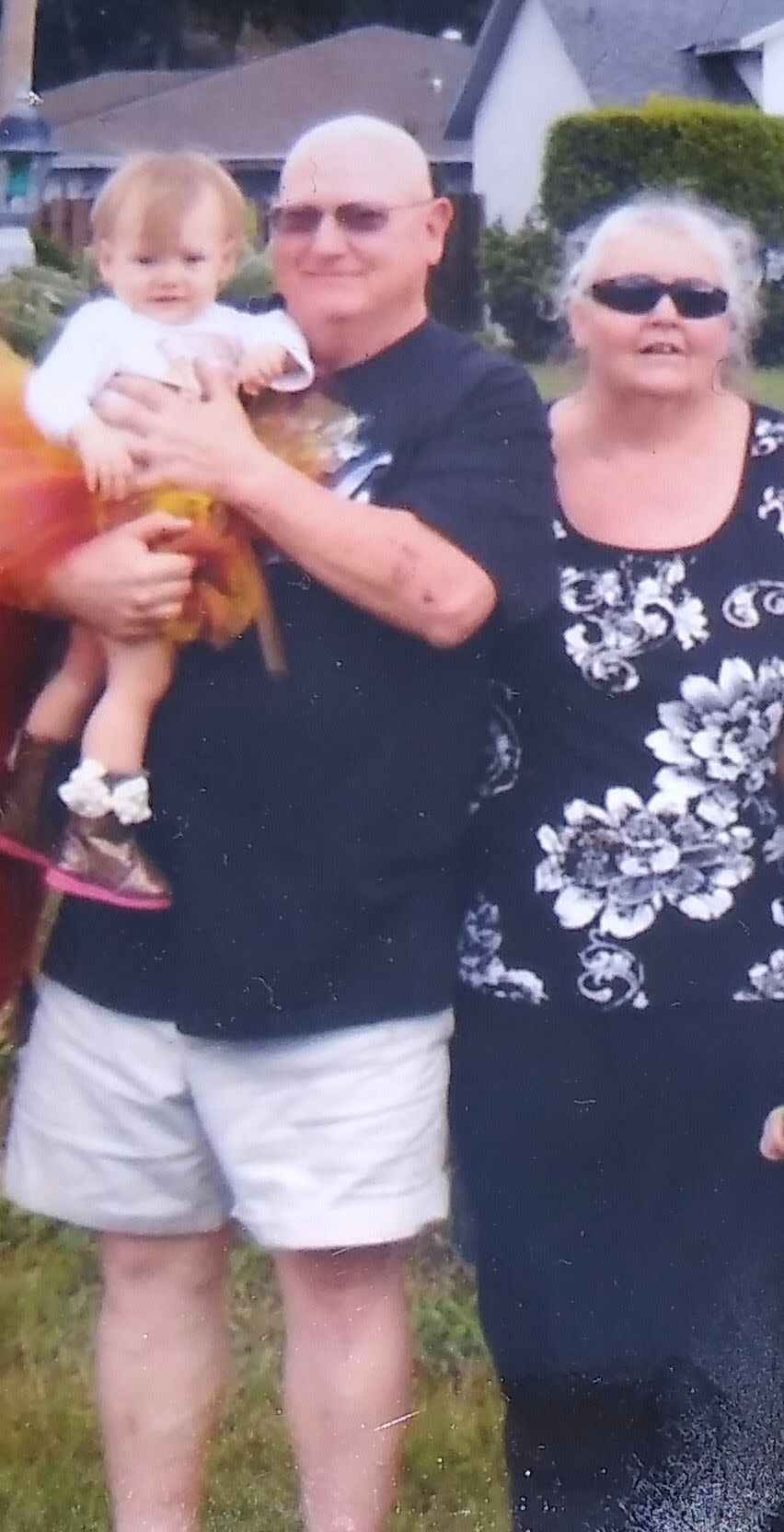 Paul Evans holds his granddaughter, Carly Evans, alongside his wife, Martha Evans, in this photo provided by family. Paul Evans died while attempting to save his grandson, 5-year-old Noah, on Feb. 6, 2019.