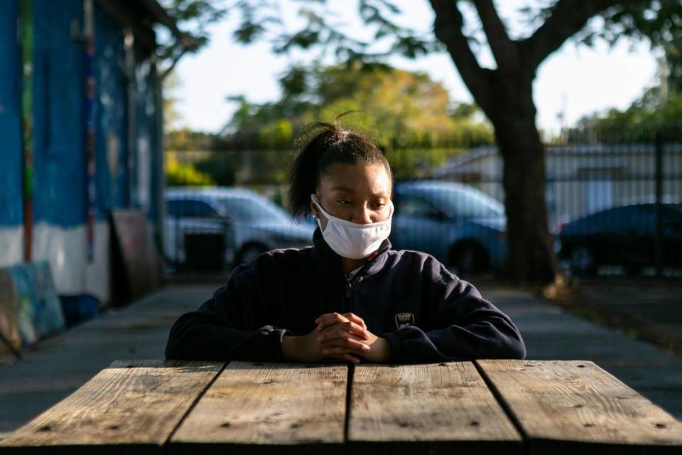Rashayna Jenkins, 13, an eighth-grader at Mater Grove Academy, at the Barnyard in Coconut Grove. Rashayna has been struggling to keep her grades up ever since the coronavirus pandemic closed schools and forced students to attend classes online.