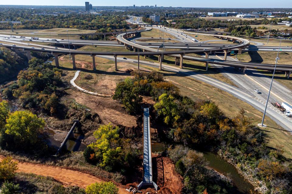 The Deep Fork Trail is shown being built with a bridge span through the junction of Interstate 235 and Interstate 44.