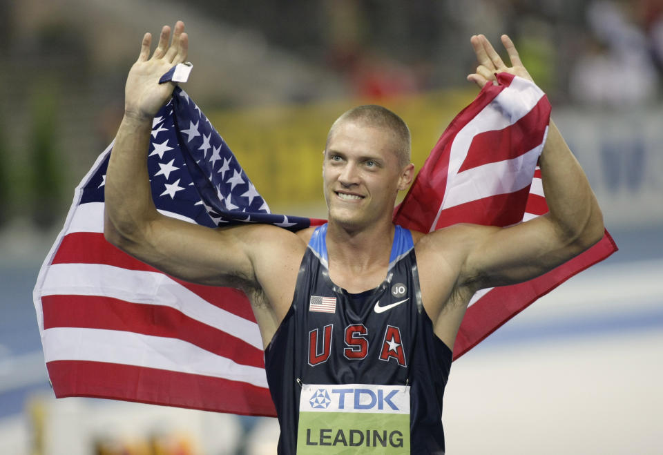 FILE - United States' Trey Hardee celebrates winning the gold after the Men's Decathlon at the World Athletics Championships in Berlin on Thursday, Aug. 20, 2009. (AP Photo/Herbert Knosowski, File)