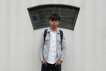 Pro-democracy student leader Joshua Wong, 20, poses near his home in Hong Kong, China March 31, 2017. REUTERS/Bobby Yip