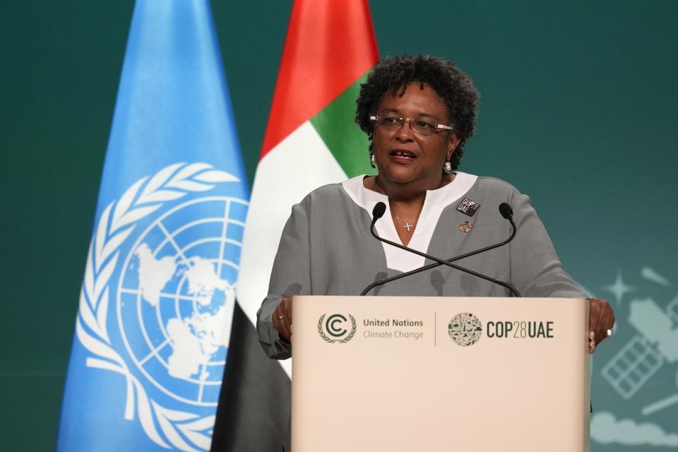 Barbados Prime Minister Mia Mottley speaks during a plenary session at the COP28 U.N. Climate Summit, Saturday, Dec. 2, 2023, in Dubai, United Arab Emirates. (AP Photo/Rafiq Maqbool)