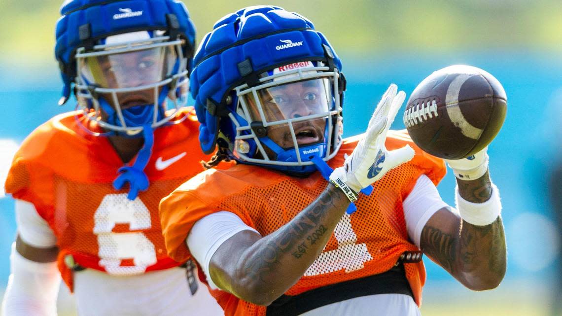 Boise State safety Rodney Robinson catches a football during defensive drills at fall camp, Thursday, Aug. 17, 2023.