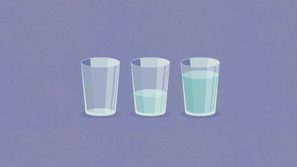 three cups. from left to right, one is empty, one is half full, one is full