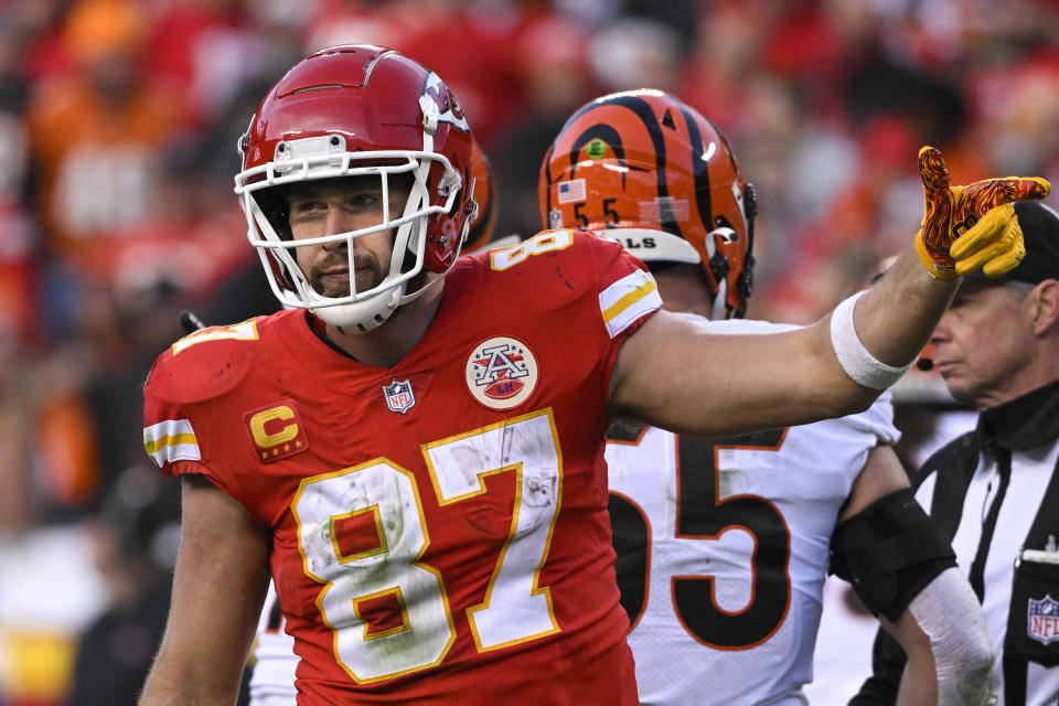 FILE - Kansas City Chiefs tight end Travis Kelce signals a first down against the Cincinnati Bengals during the second half of the NFL AFC Championship football game Jan. 30, 2022 in Kansas City, Mo. No position in the NFL has undergone more changes to the style of player over the years than tight end. Long gone are the days of the blocking specialists who serve mainly as an extra offensive lineman. While guys like Rob Gronkowski, George Kittle and Kelce are excellent run-blockers, they are also outstanding receivers and major weapons on offense. (AP Photos/Reed Hoffmann, File)