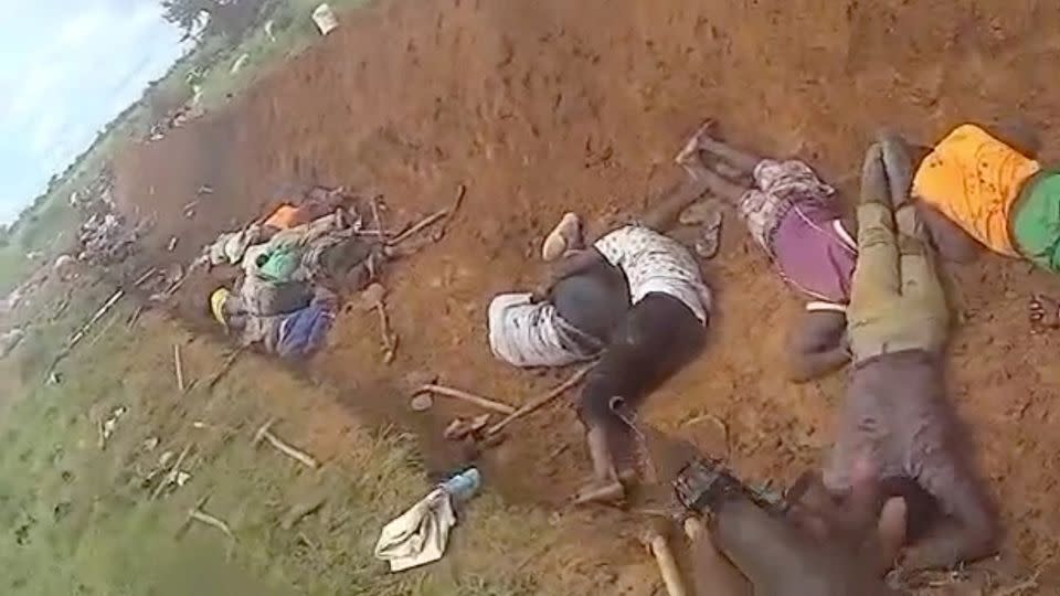 A screen grab from a video shared on social media on August 24, 2024, shows the bodies of people who were killed by jihadists as they were digging a trench to protect their town of Barsalogho, Burkina Faso. - Reuters